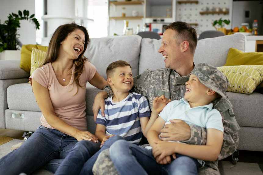 Two adults with two children